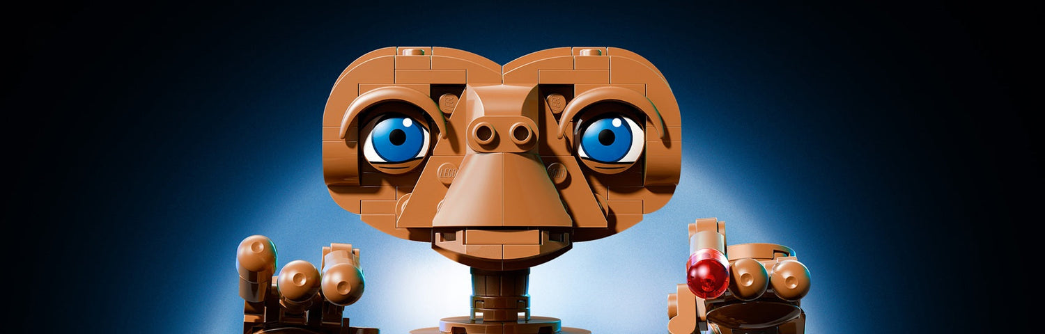E.T. peeking over image edge with blue background