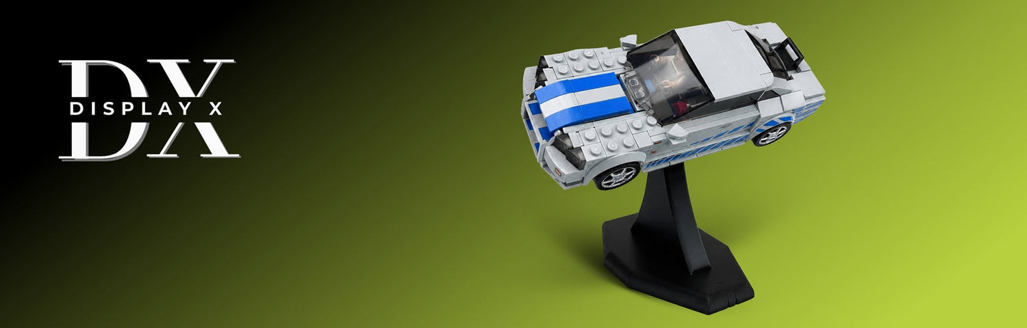 DisplayX stand holding LEGO car, with green background