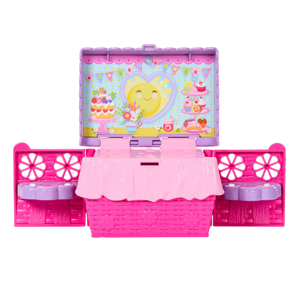 Picnet set opens up into a table and chairs, in the Barbie Family & Friends Chelsea Tea Party Picnic Playset