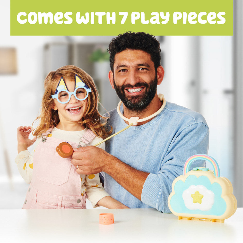 Dad and daughter playing with the Bluey Cloud Bag Doctor Set including Stethoscope, Syringe, and Bandages.