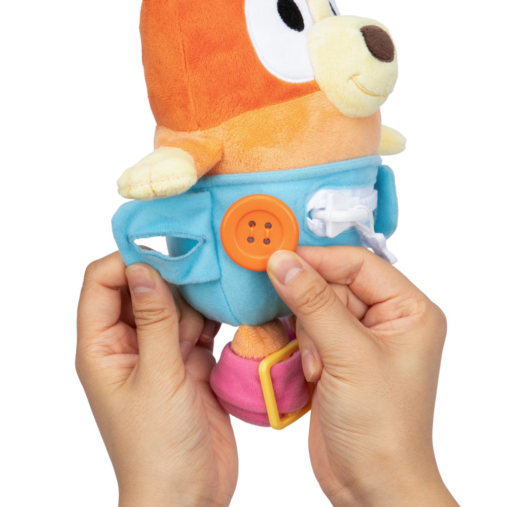 Learn how to dress, tie your shoes, buckle, zip, and use velcro, with Bluey Dress & Play Baby Bingo.