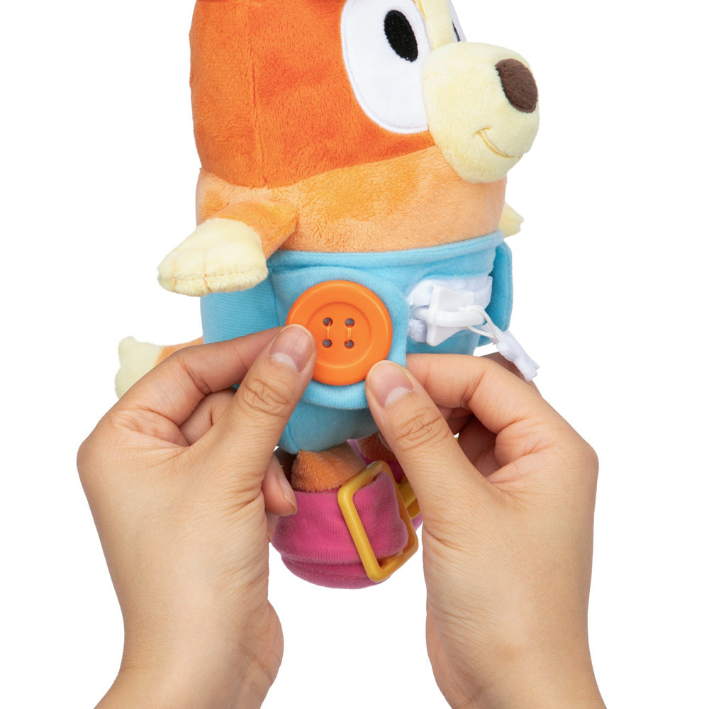 Learn how to dress, tie your shoes, buckle, zip, and use velcro, with Bluey Dress & Play Baby Bingo.
