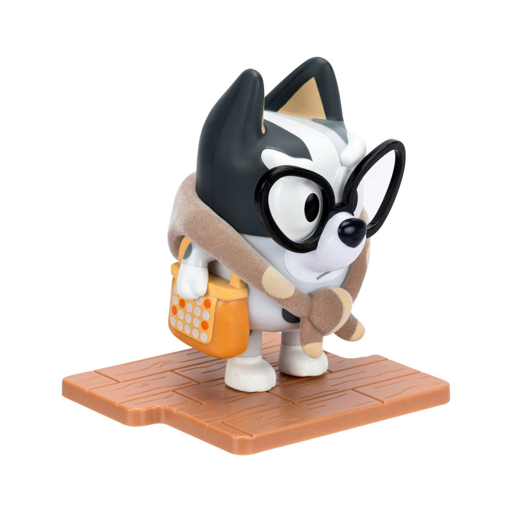 Bluey Studio Collector Figure Series 14 Granny Muffin toy on removable display base.