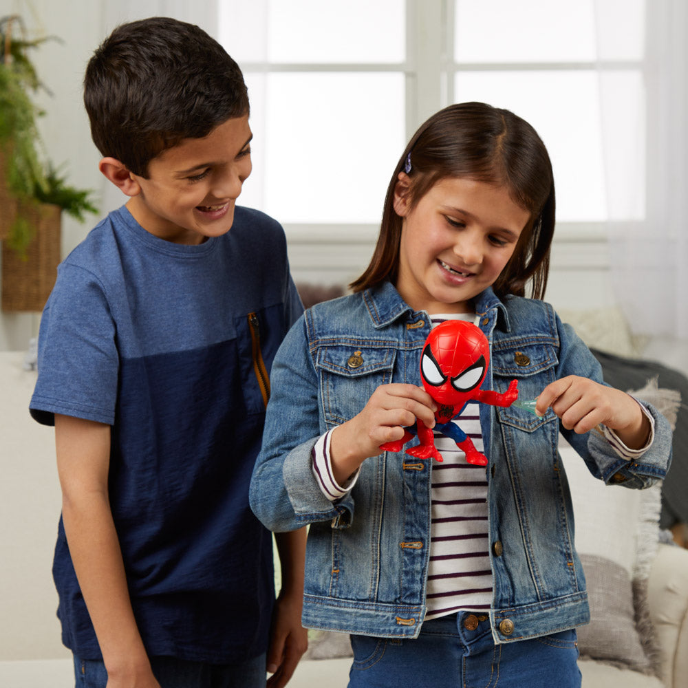 Children playing with the Bop It! Marvel Spider-Man Edition game toy