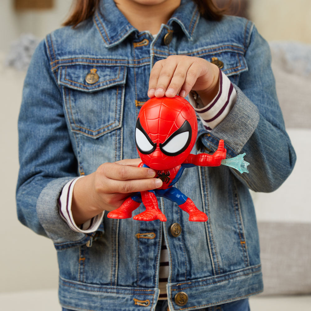 Children playing with the Bop It! Marvel Spider-Man Edition game toy