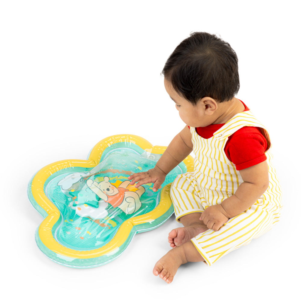 Baby playing with the Bright Starts Winnie the Pooh Once Upon A Tummy Time Water Mat