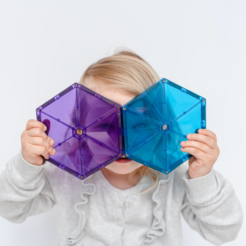 Child playing with the CONNETIX Magnetic Tiles 212 Piece Rainbow Mega Pack