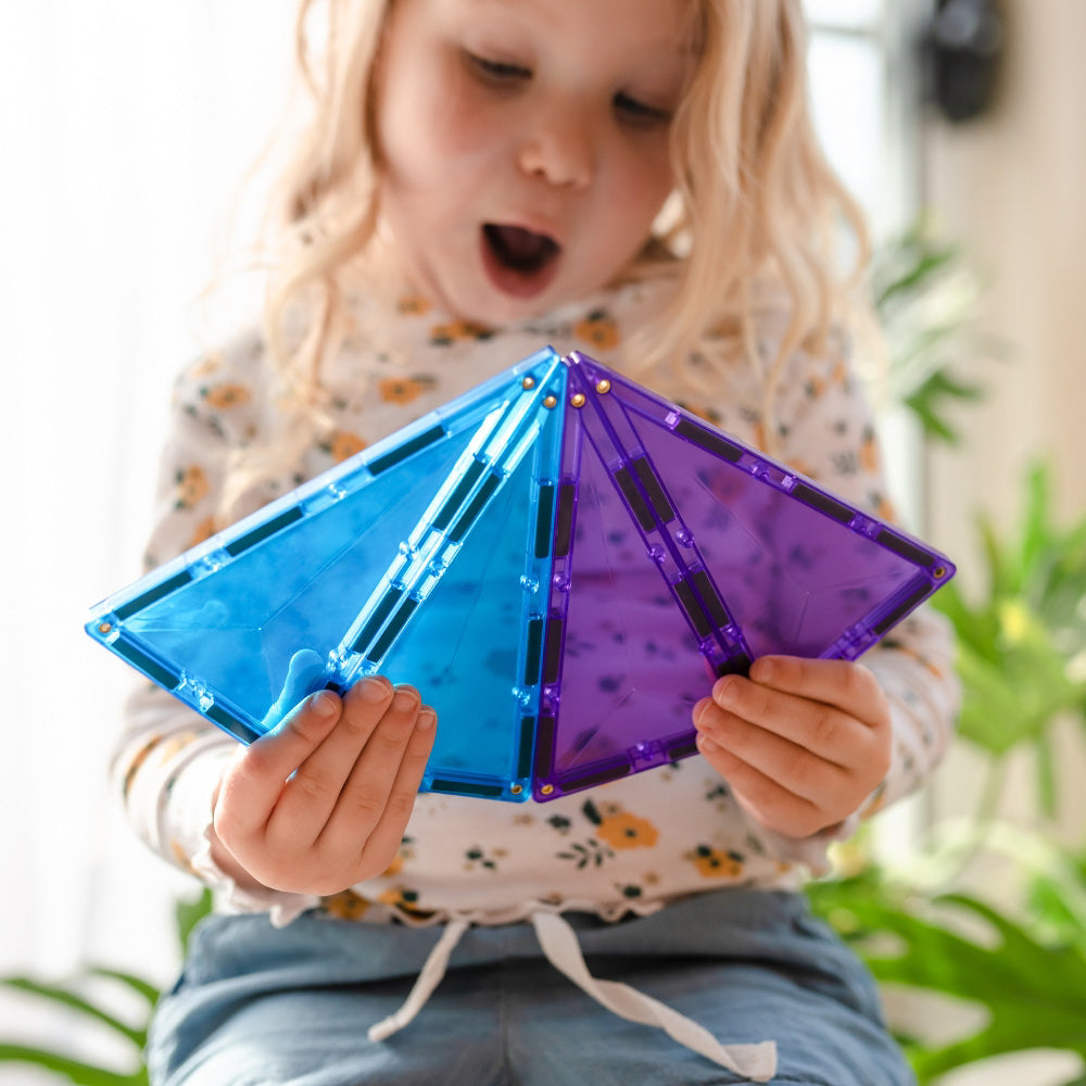 Child playing with CONNETIX Magnetic Tiles 30 Piece Rainbow Geometry Pack