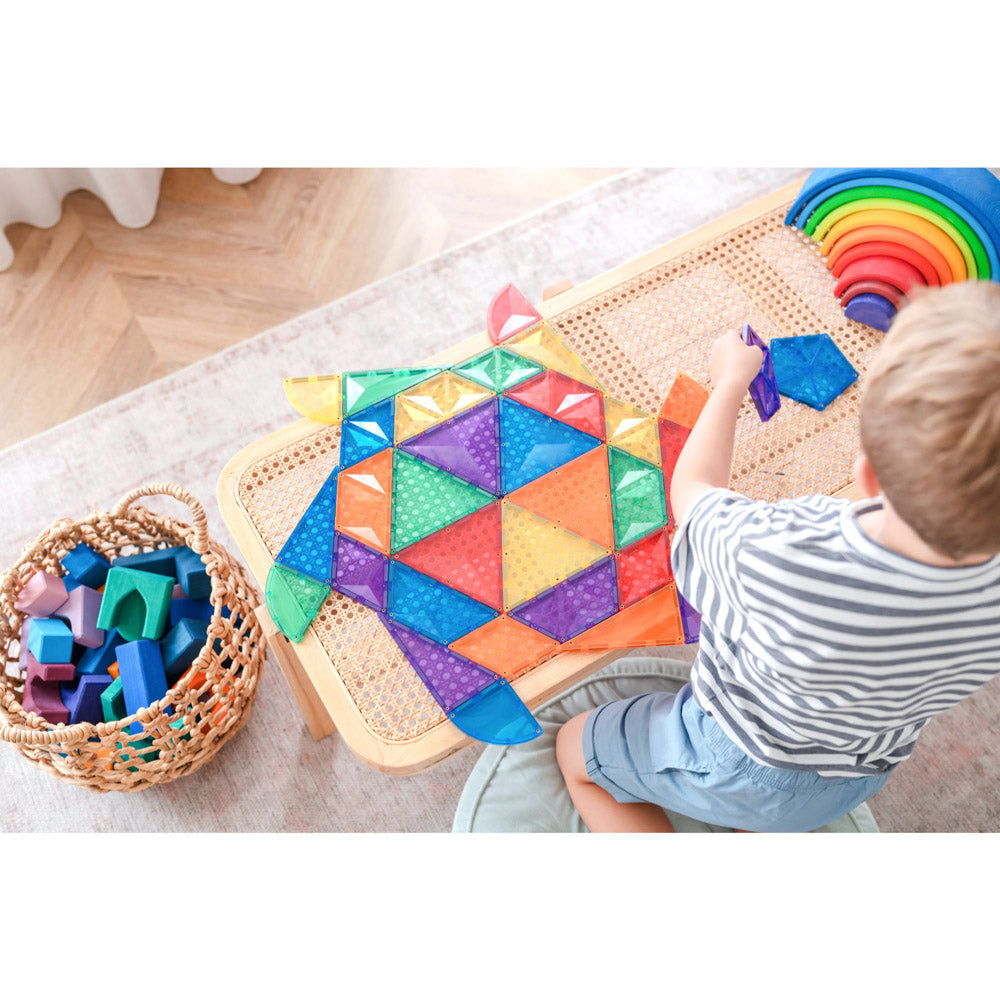 Child playing with the CONNETIX Magnetic Tiles 36 Piece - Rainbow Expansion Pack