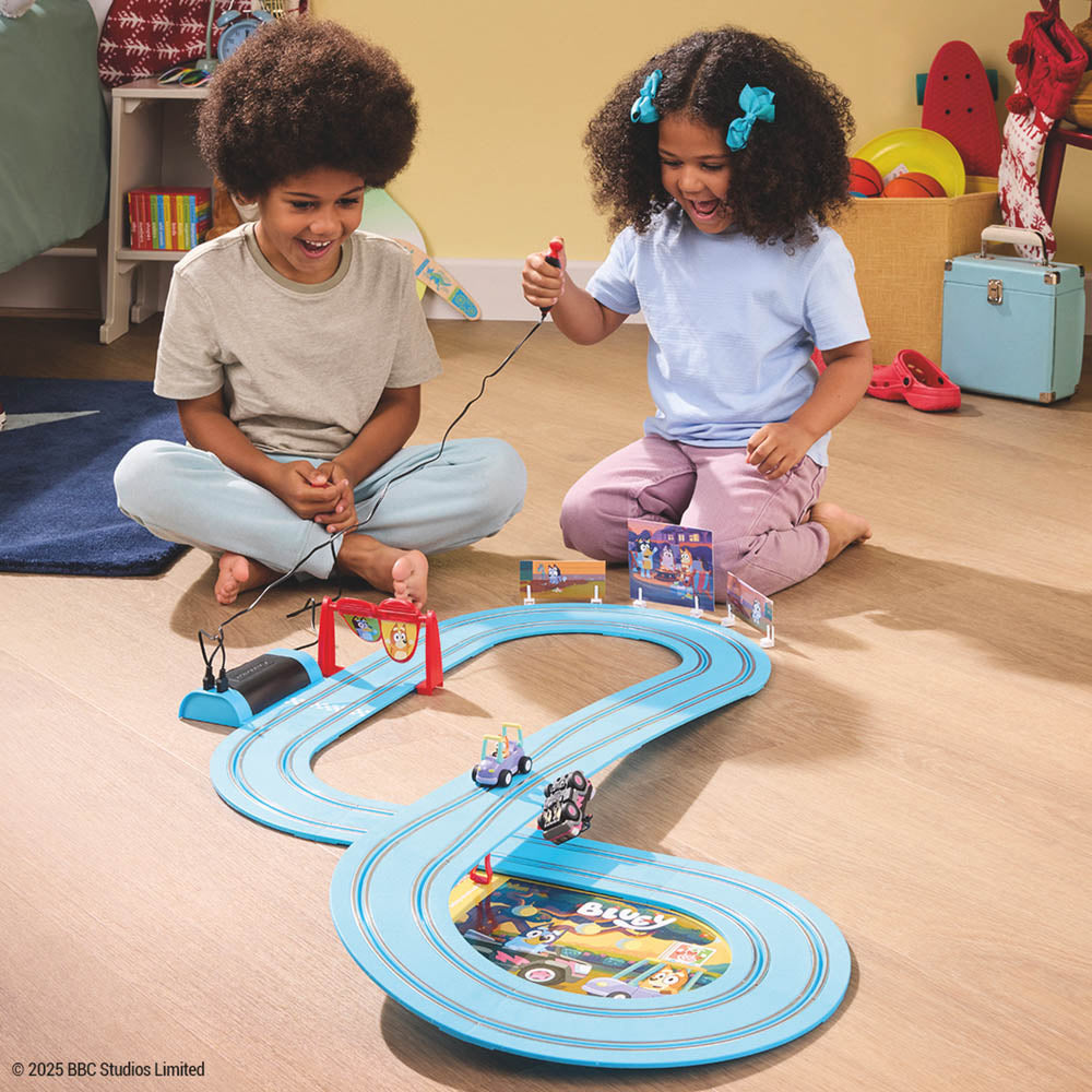 Carrera First Bluey & Bingo Let's Go! Slot Car Set on race track.