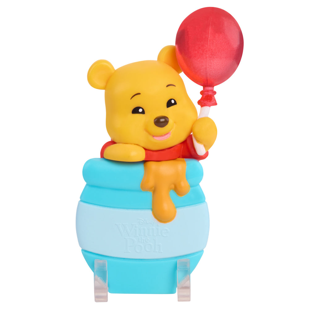 Disney Winnie the Pooh Attachmeez Blind Box toy.