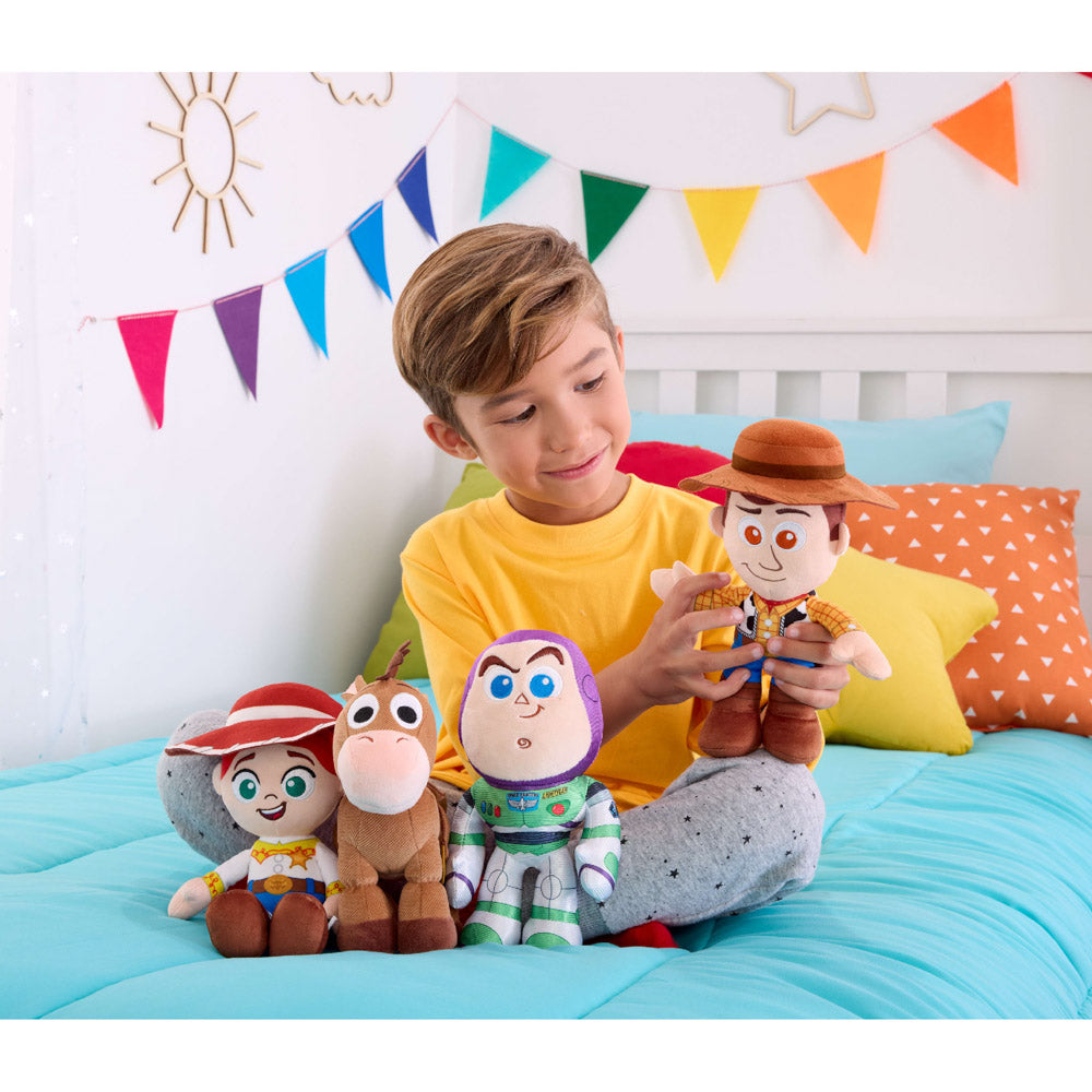 Child playing with the Toy Story 5 8-Inch Plush soft toys