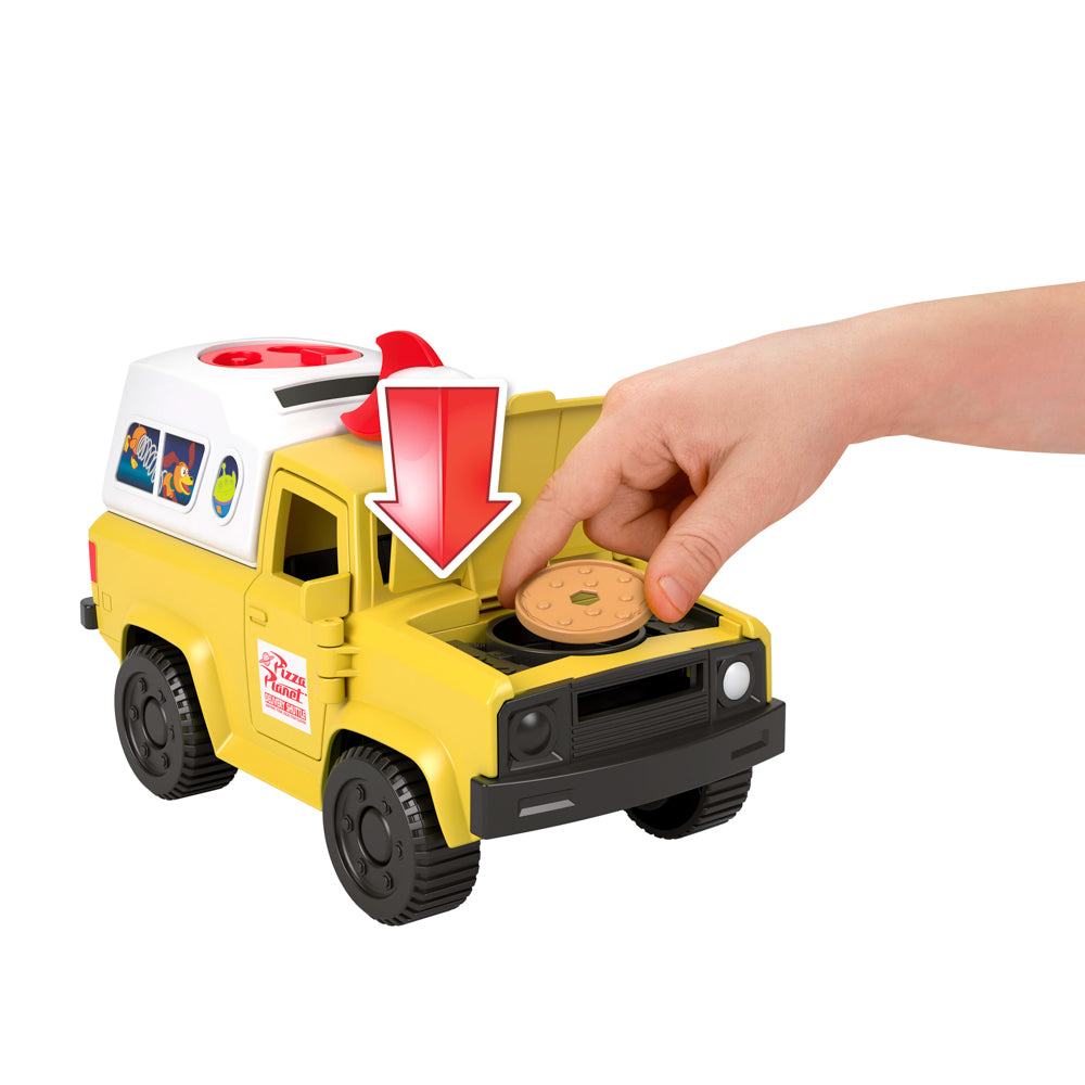 Load the pizzas in the truck shooter, in the Fisher-Price Imaginext Toy Story Pizza Planet Truck with Buzz lightyear and alien figures set