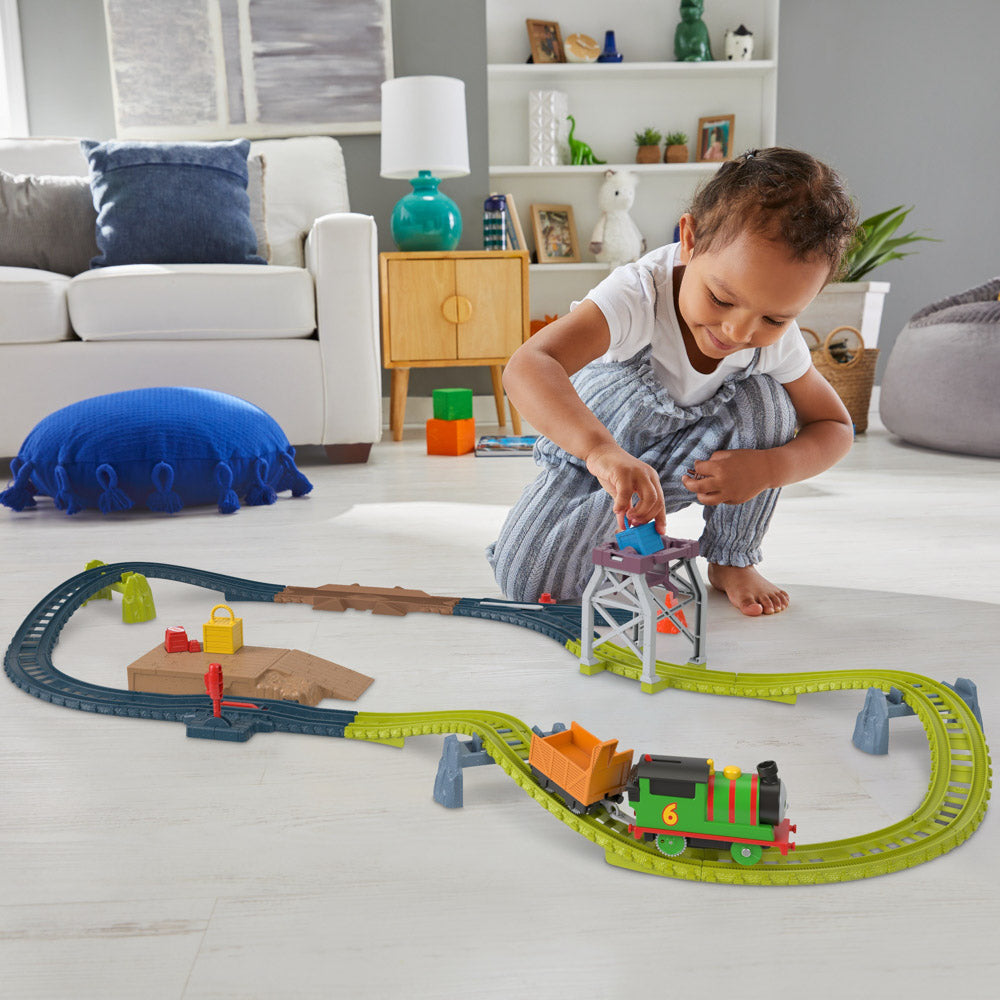 Fisher-Price Thomas & Friends Motorized Train & Track Set Percy's Package Roundup playset.