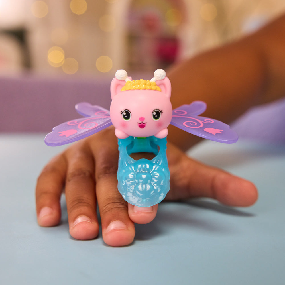 Child wearing the Gabby's Dollhouse Fairylandia Flutter-riffic Fairy Ring - Kitty Fairy