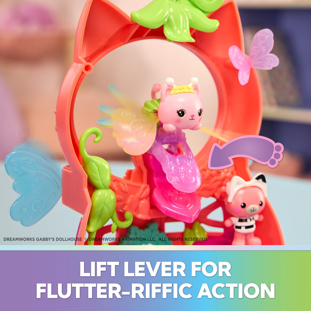 Make fairy bear's wings move by lifting lever, on the Gabby's Dollhouse Fairylandia Kitty Fairy's Flutter-riffic Rings Playset