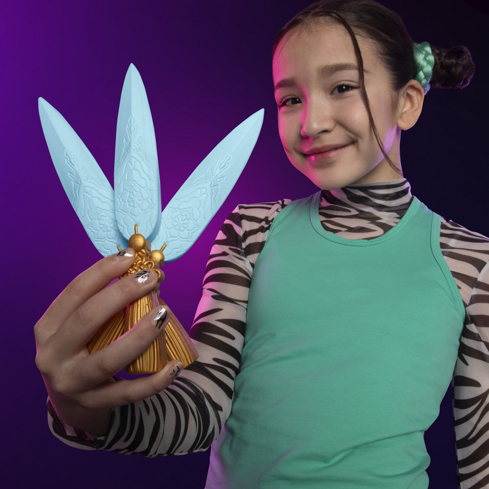 Girl posing with the KPop Demon Hunters Zoey's Spirit Blade toys