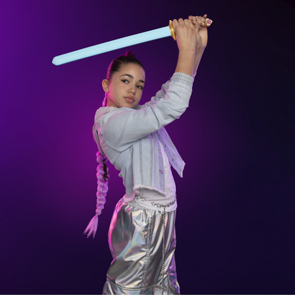 Girl holding KPop Demon Hunters Rumi's Four Tiger Sword