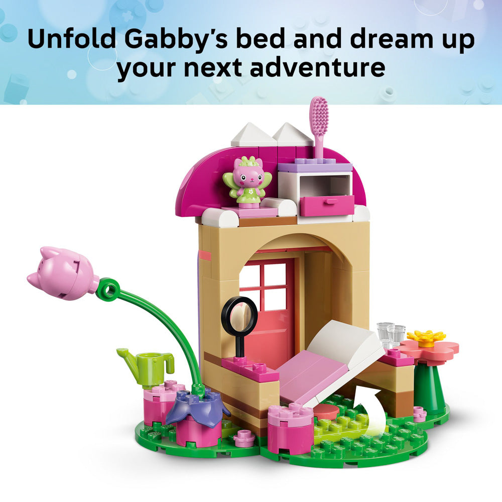 Bed folds up and down in the LEGO 11212 Gabby’s Dollhouse Kitty Fairy’s Garden House set.