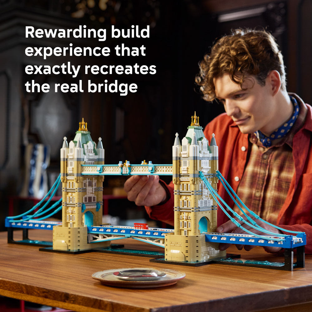 Man building the LEGO 21067 Architecture Tower Bridge River Thames set.