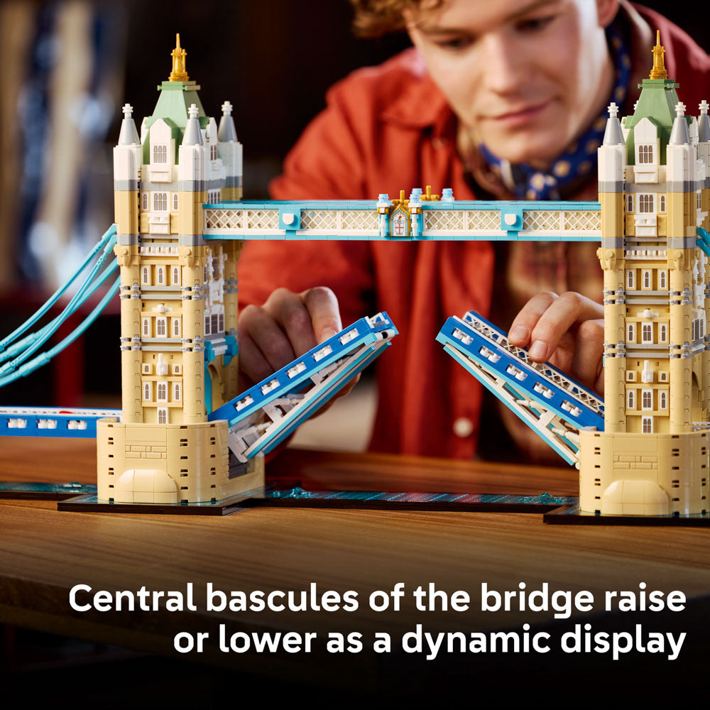 Man building the LEGO 21067 Architecture Tower Bridge River Thames set.