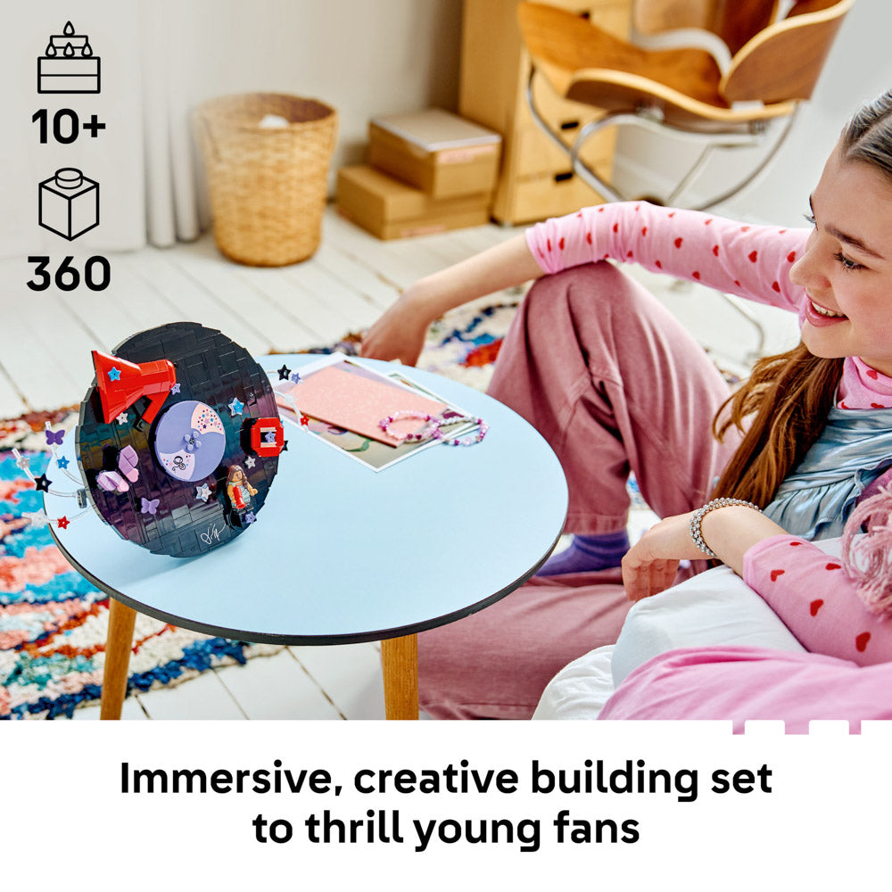 Girl looking at the assembled LEGO 43028 Editions Music Olivia Rodrigo's Vinyl set