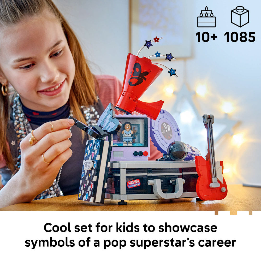 Girl playing with the assembled LEGO 43030 Editions Music Olivia Rodrigo's Secret Storage set