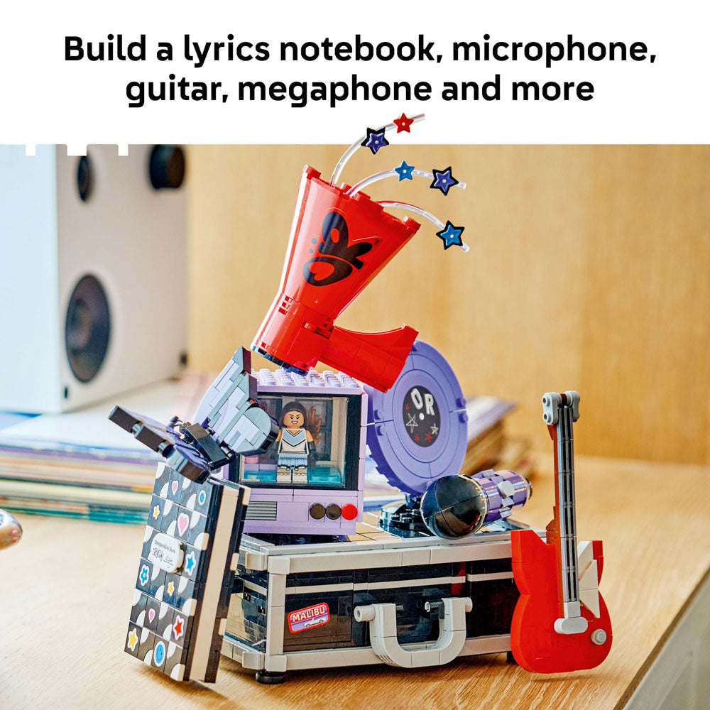 A notebook, microphone, guitar, and megaphone included in the LEGO 43030 Editions Music Olivia Rodrigo's Secret Storage set.