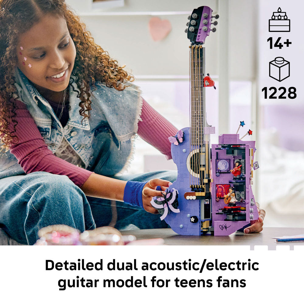 Teenager playing with the assembled LEGO 43031 Editions Music Olivia Rodrigo's Dual Guitar set