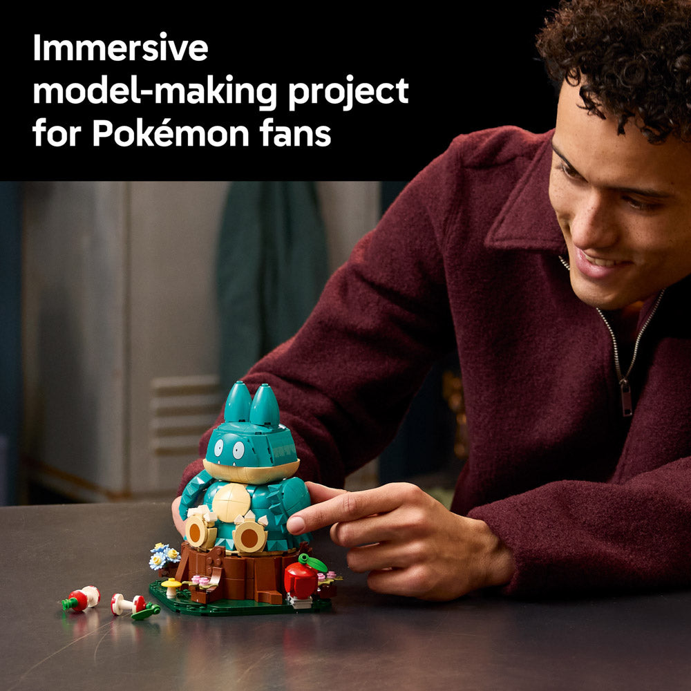 Man building the LEGO 72150 Pokémon Munchlax Set for Adults