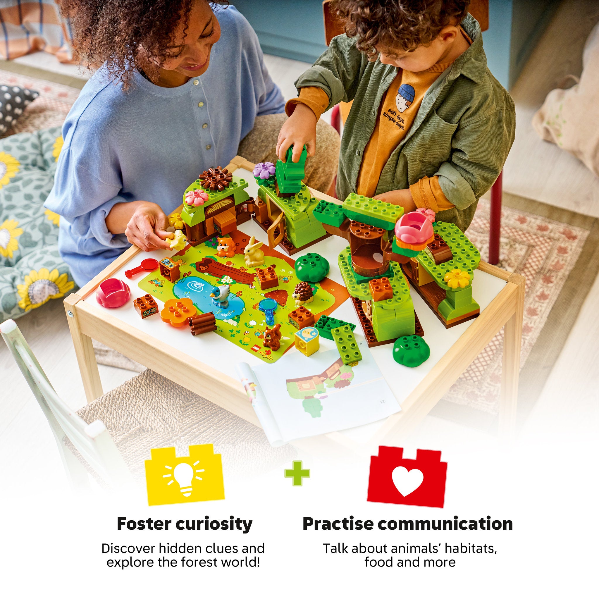 Toddler playing with the LEGO 10480 DUPLO Town Discovery Forest with Wild Animals Set