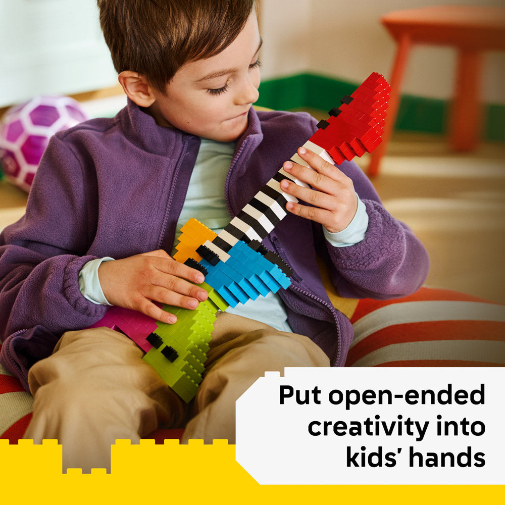 Child building a lego guitar, with the LEGO 11045 Classic Creative Colourful Bricks Blocks Loose Free-play Set