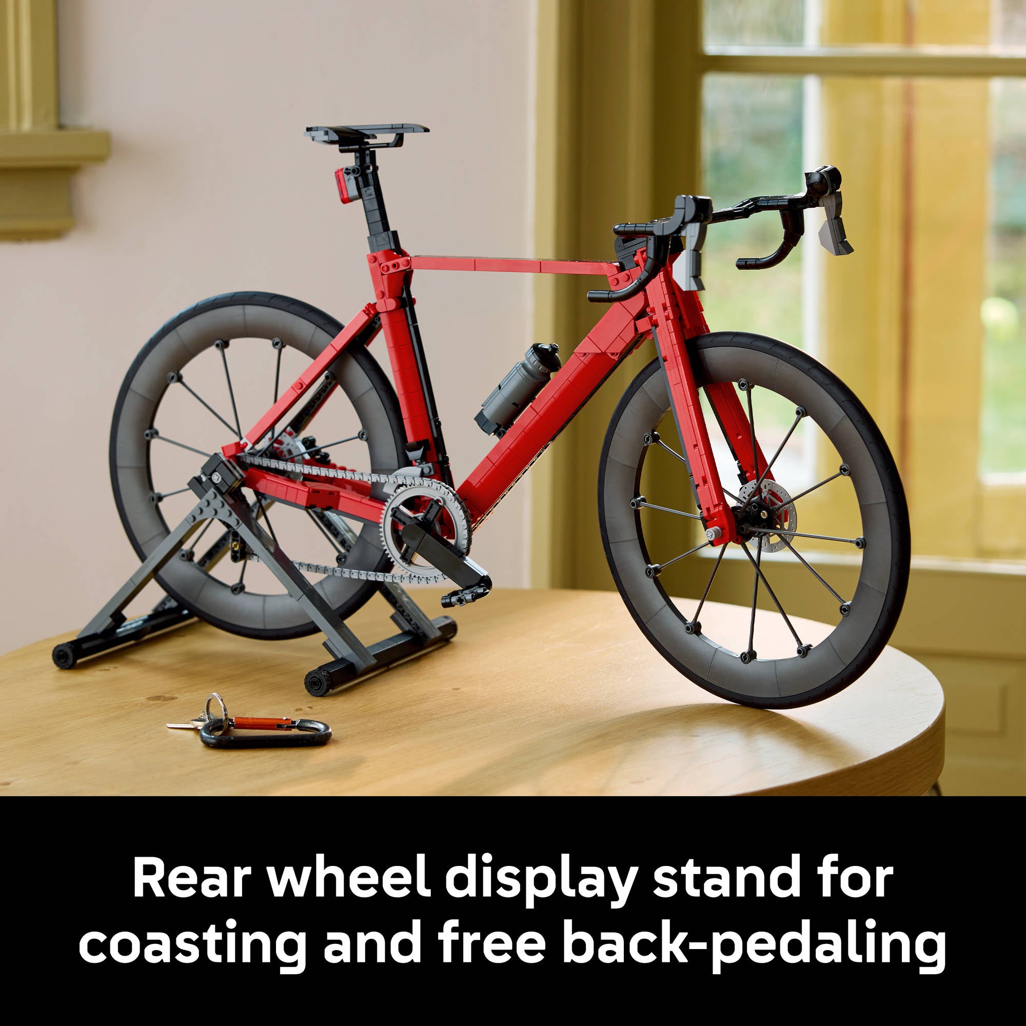 Rear wheel display stand, on the LEGO 11380 Icons Road Bike Cycle Red Set