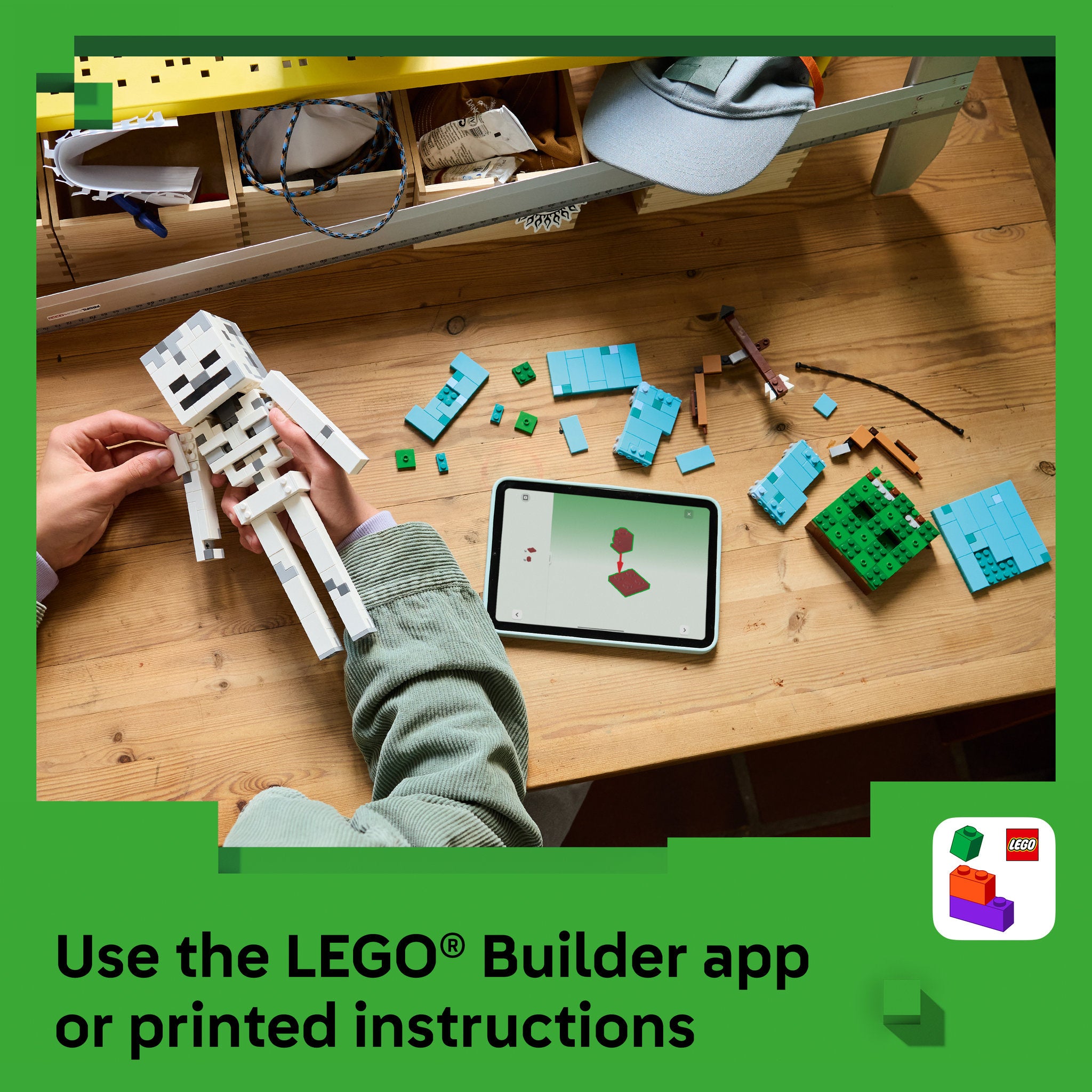 Teenager using the builder app to make the LEGO 21594 Minecraft The Skeleton Set