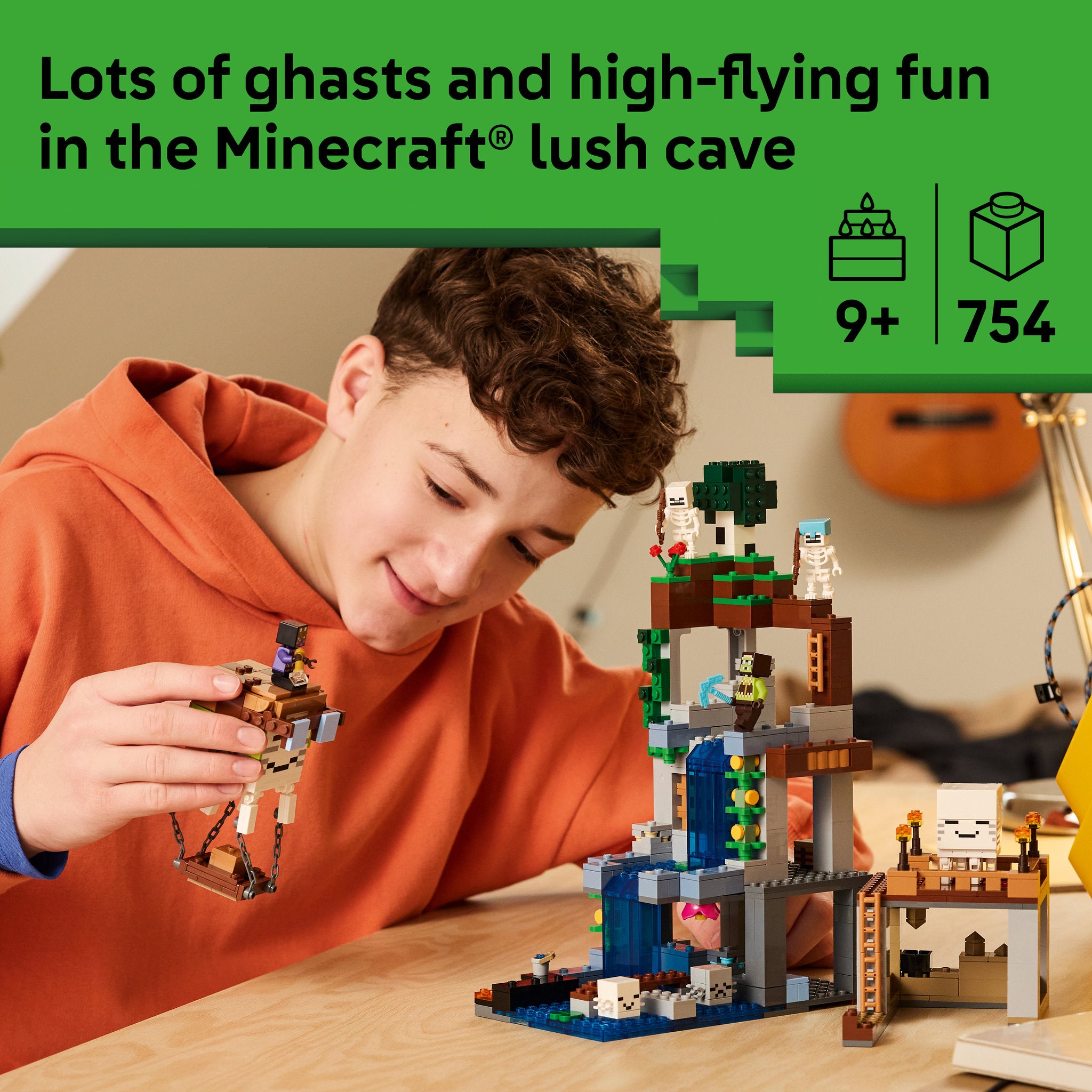 Teenager building the LEGO 21597 Minecraft Ghast Station Waterfall Set