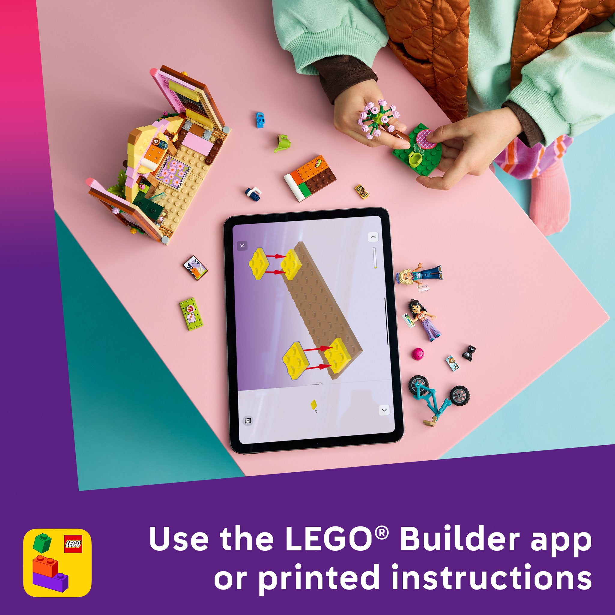 Child building the LEGO 42682 Friends Nature Glamping Cabin Set