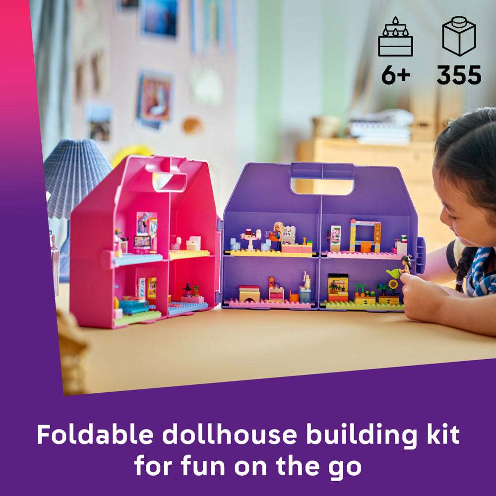 Child playing with the assembled LEGO 42697 Friends Creative Dollhouse Foldable Suitcase set pink purple