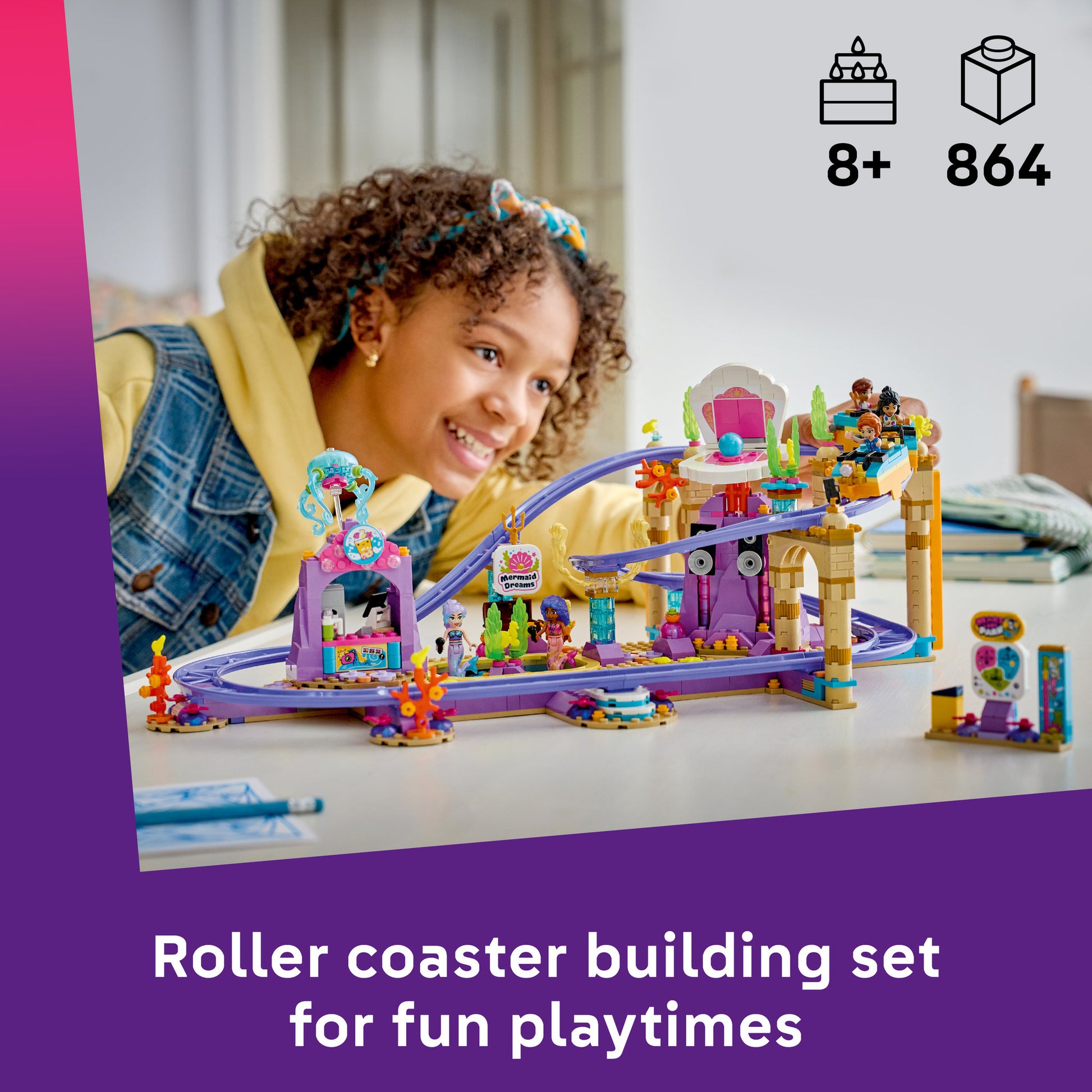 Child playing with the LEGO 42703 Friends Mermaid Roller Coaster Ride Set