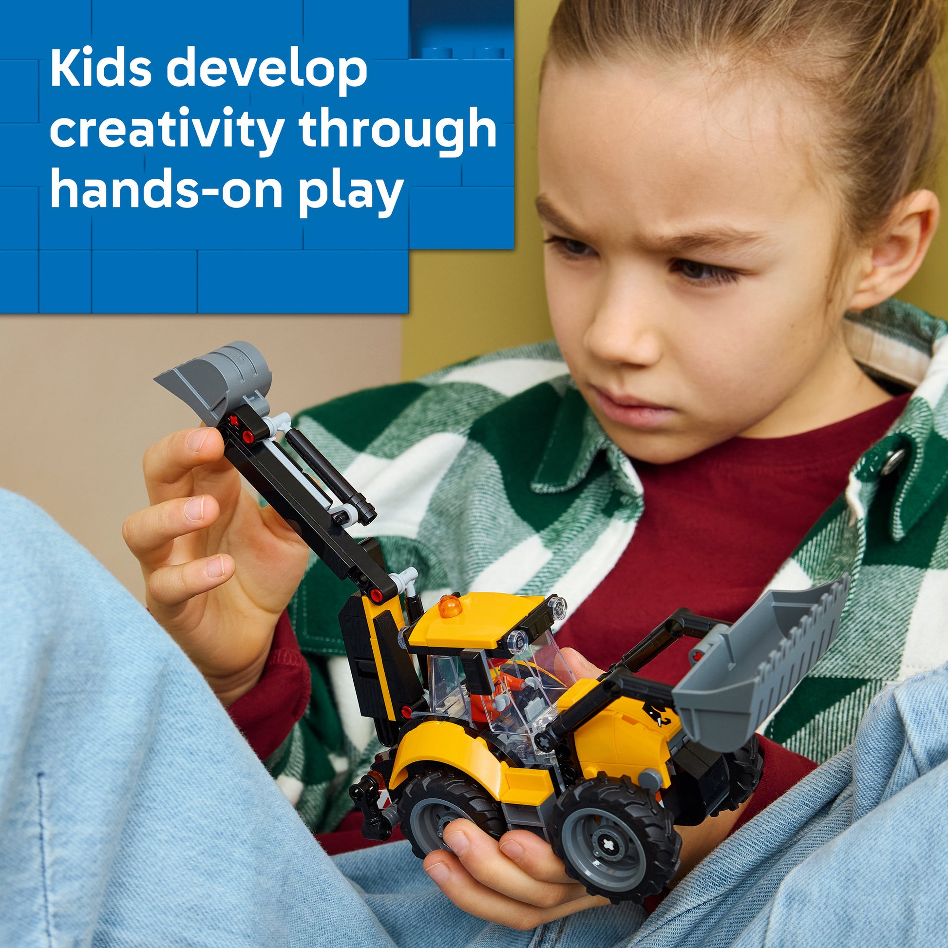 Child playing with LEGO 60480 City Yellow Backhoe Loader Set