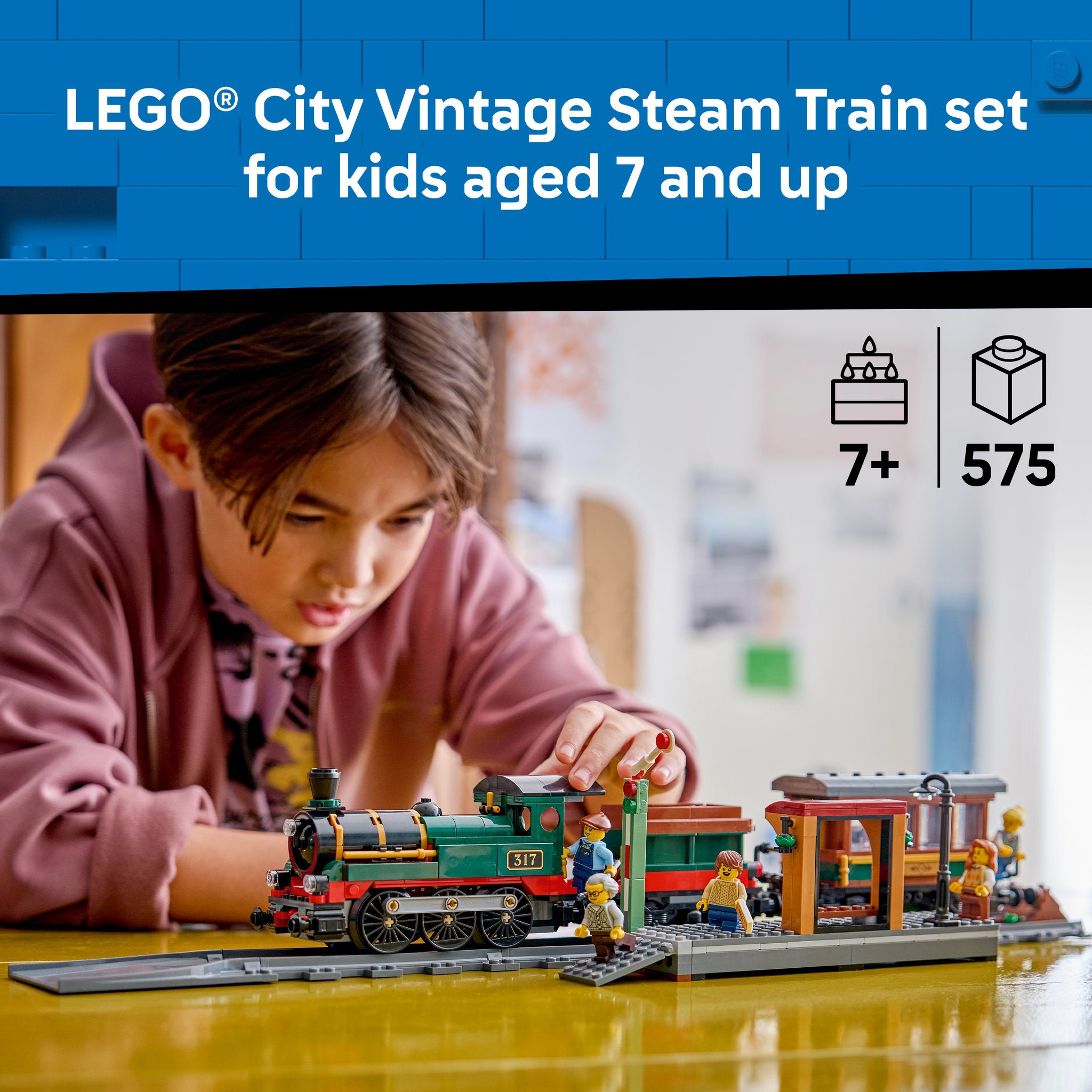 Child playing with the LEGO 60511 City Vintage Steam Train Set