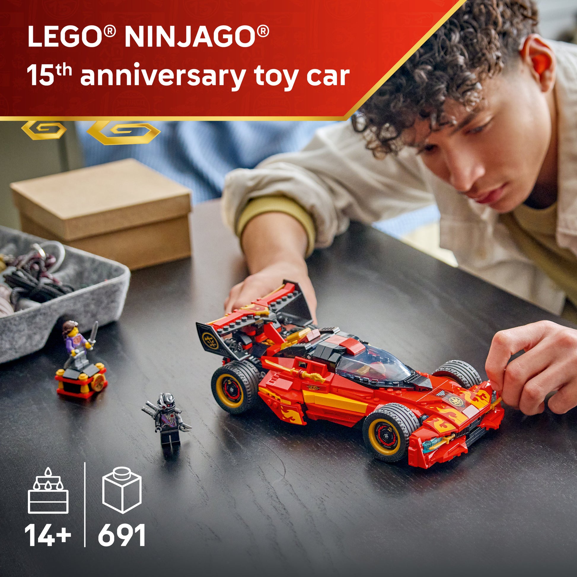 Teenager playing with the LEGO 71867 NINJAGO X-1 Ninja Charger 15th Anniversary Set