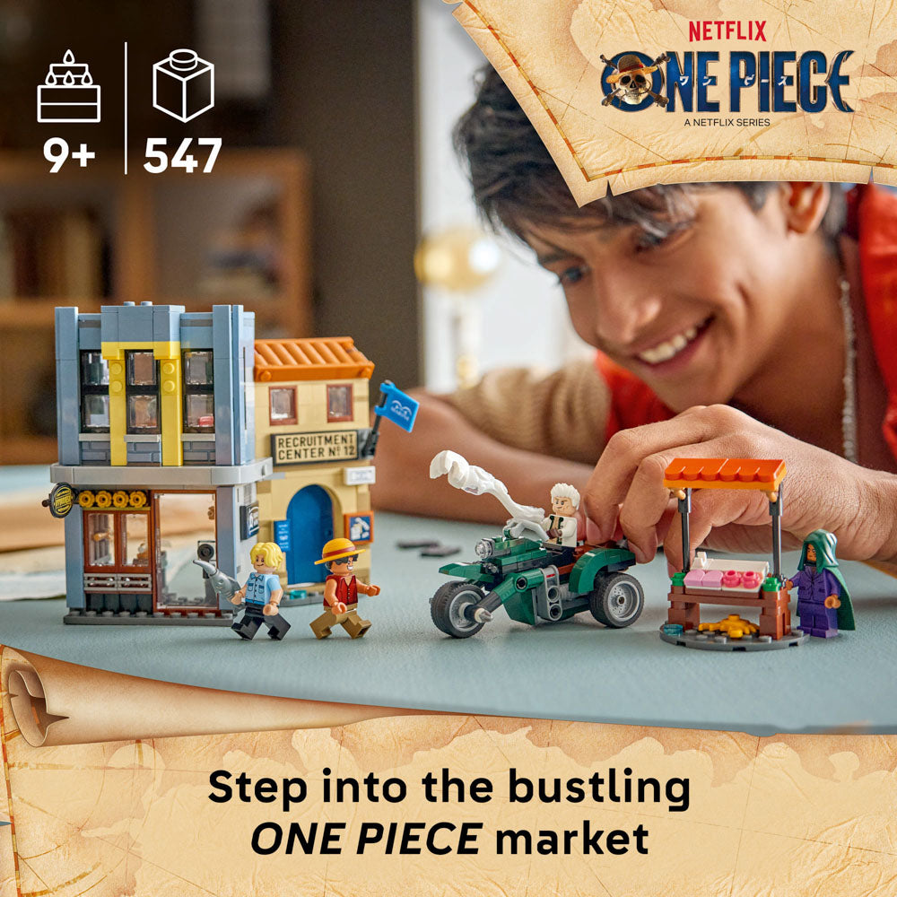Man playing with the LEGO 75642 ONE PIECE Showdown with Captain Smoker set