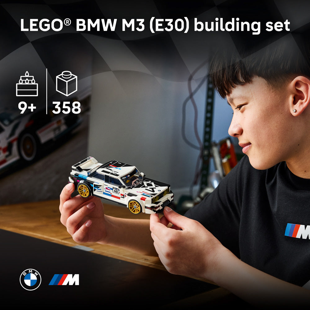 Boy holding the assembled LEGO 77263 Speed Champions BMW E30 Mr Special Edition set