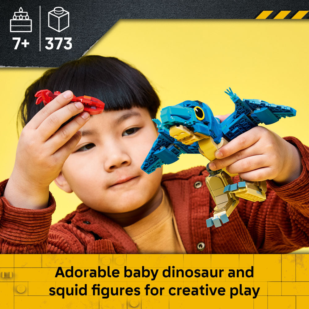Child playing with the assembled LEGO 77977 Jurassic World Baby Dinosaur Pteranodon