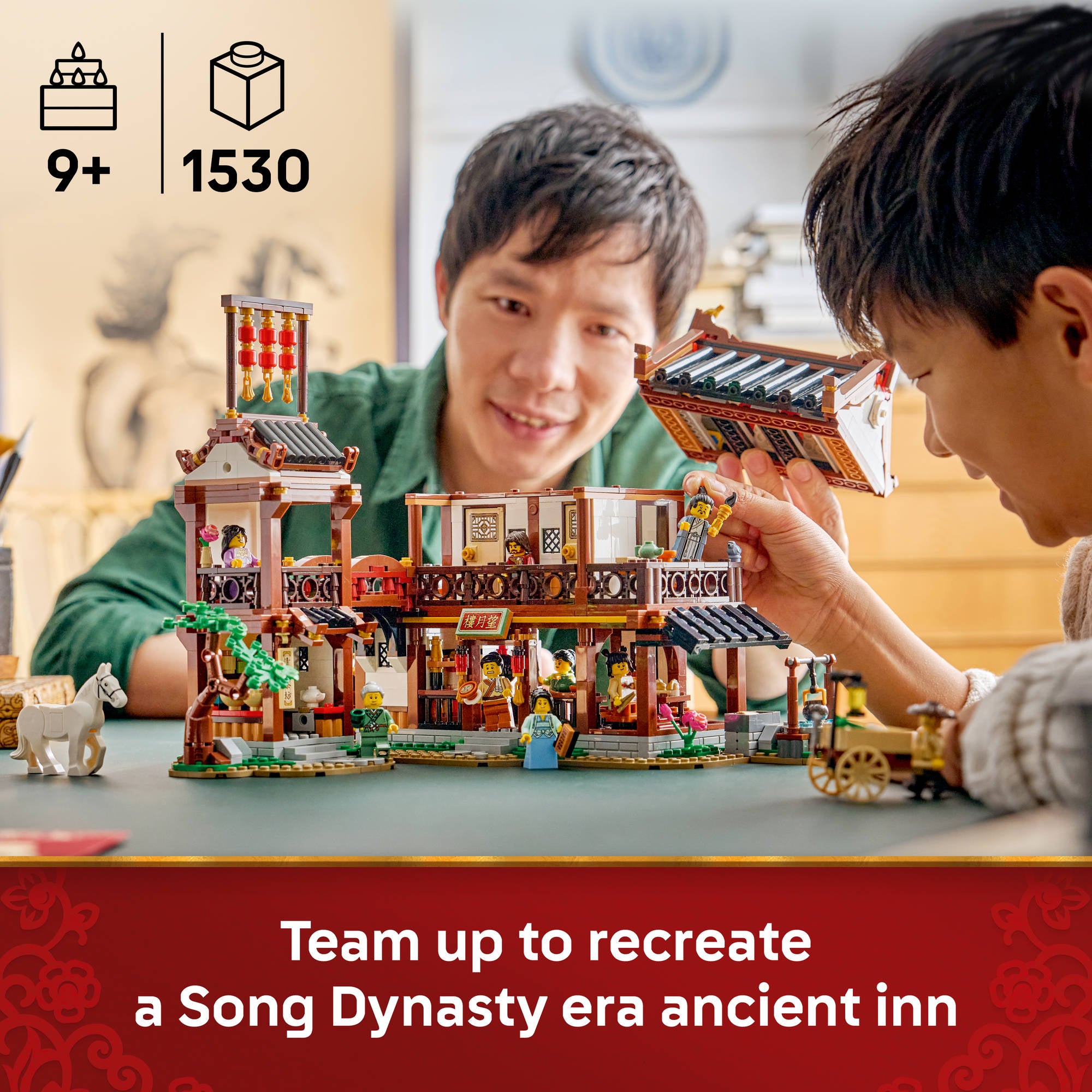 Two adults assembling the LEGO 80121 Ancient Moon Gazing Inn Set