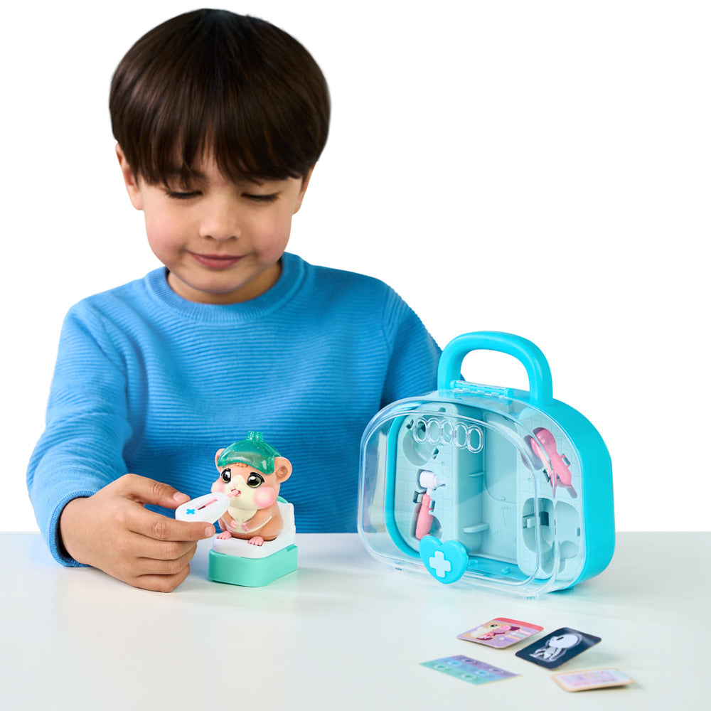 Child playing with the Little Live Pets Ouchies Series 2 Mini Coco hamster