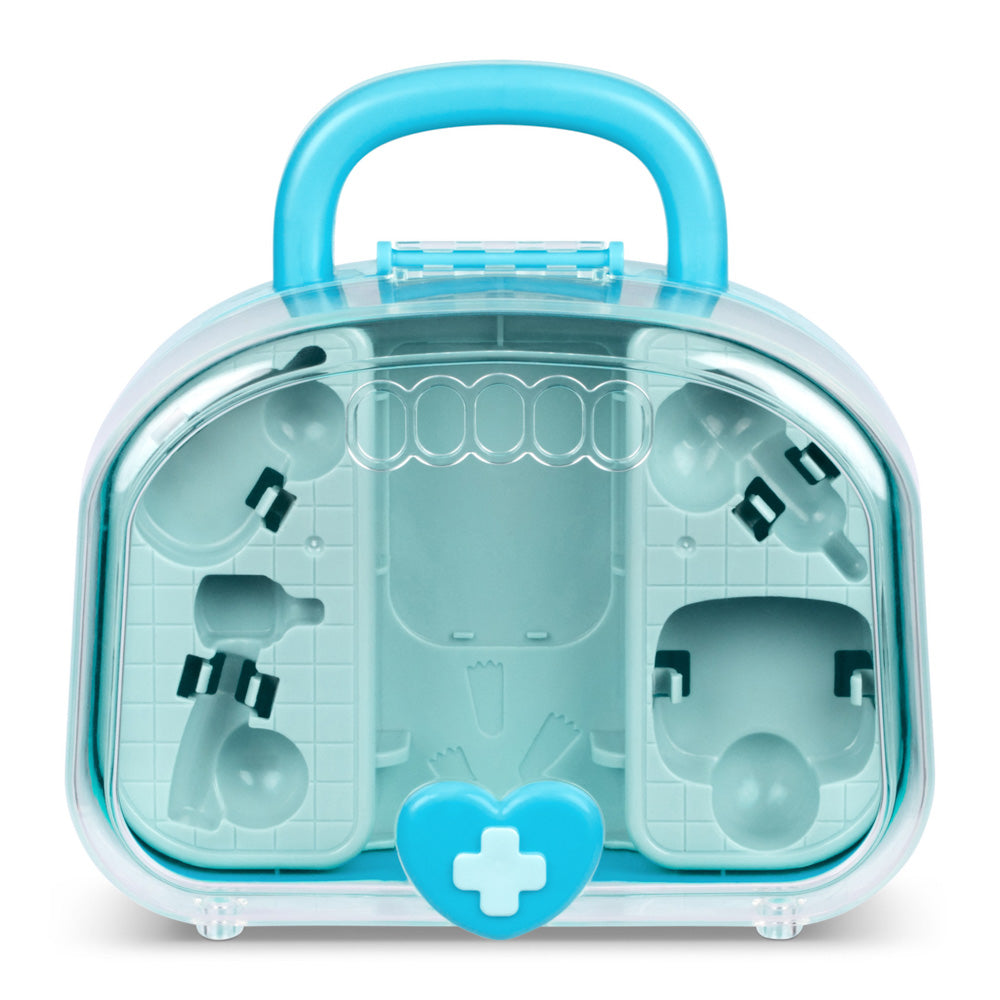 Empty vet bag in the Child playing with the Little Live Pets Ouchies Series 2 Mini Coco hamster playset