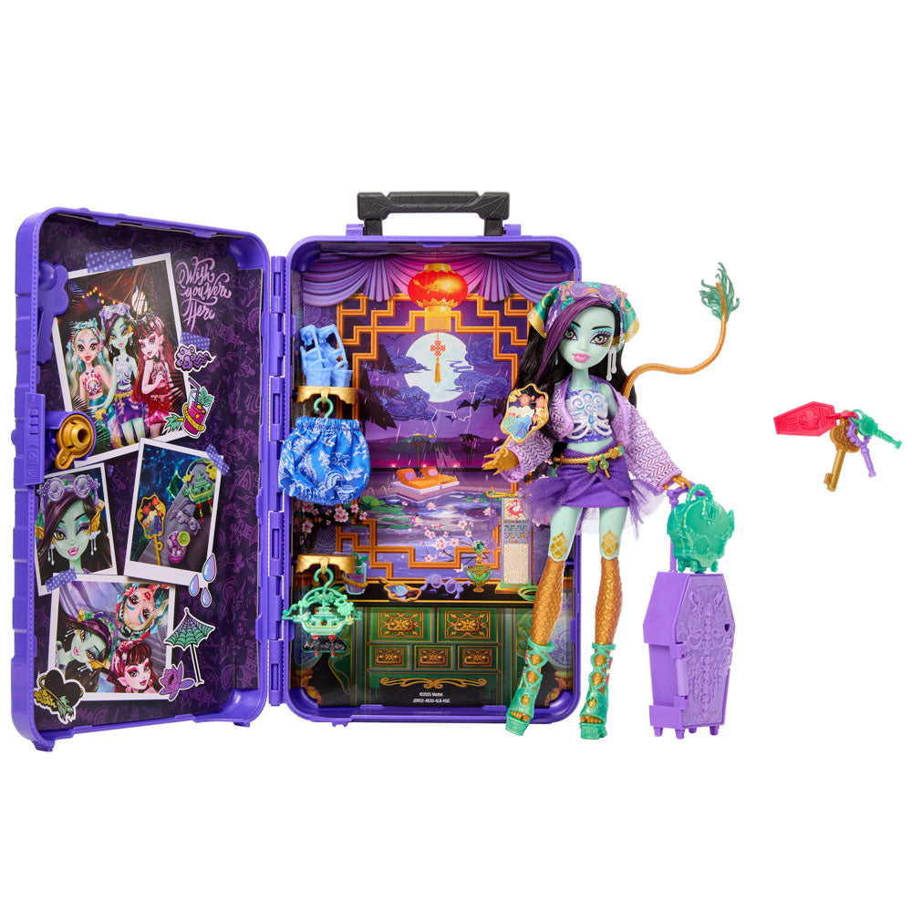 Monster High Skulltimate Secrets Gore-geous Oasis Series 7 Jinafire Long doll with green skin, standing with an open suitcase