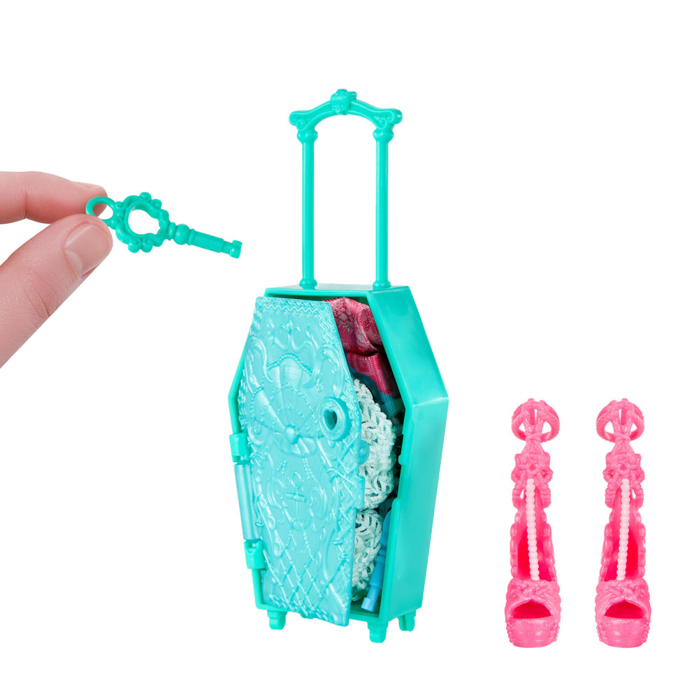 Mini suitcase and shoes included in the Monster High Skulltimate Secrets Gore-geous Oasis Series 7 Lagoona Blue doll