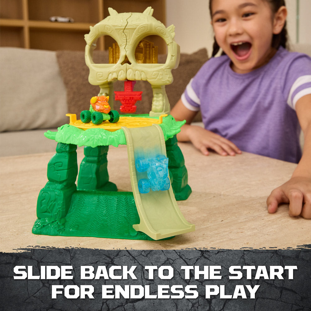 Child playing with the Monster Jam: Mini Jams Crash & Crumble Jungle Toy Truck Playset